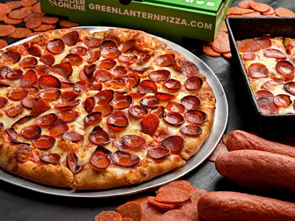 pepperoni pizza with pepperoni slices next to it