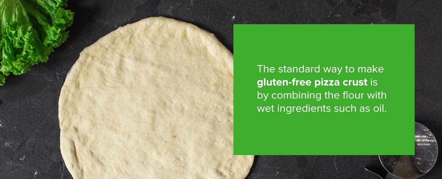 The standard way to make gluten-free pizza crust is by combining the flour with wet ingredients